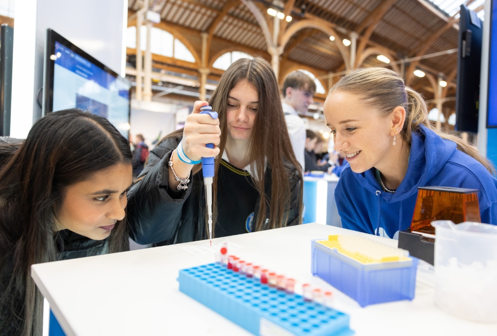Students from St Laurence College learn how to micro pipette at the Amgen Foundation Stand at the Stripe Young Scientist and Technology Exhibition 2026.